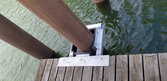 Aluminum Pile Brackets with UHMW Blocking